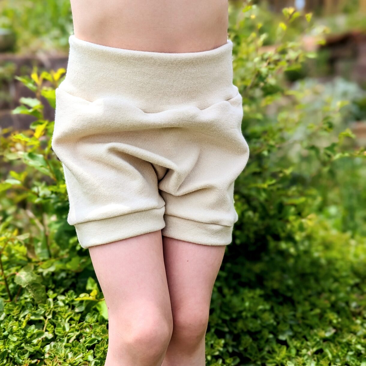 Merino Wool Shorties in Natural Cream showing front view giving added bulk to pair with cloth diapers or room for a looser fit article of clothing.