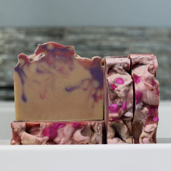 Pink and purple bar soap in berry scent
