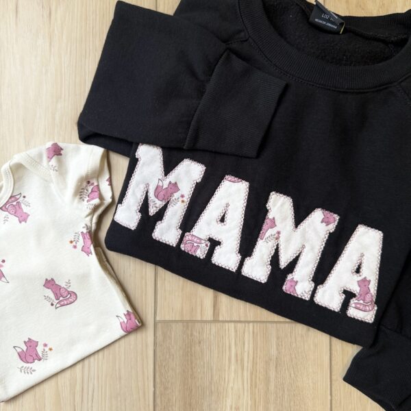 Sweatshirt with embroidered applique lettering