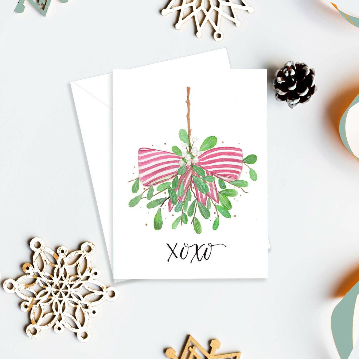 Mistletoe XOXO Card mockup - Pelavida - Shop For Life