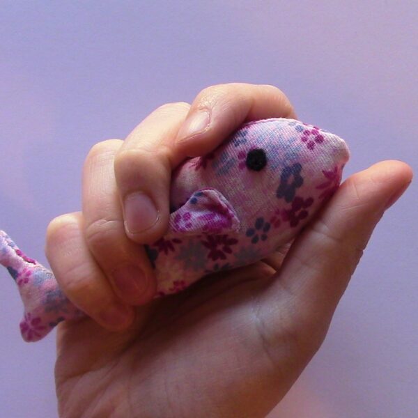 hand sewn pocket sized pink flower patterned stuffed fish