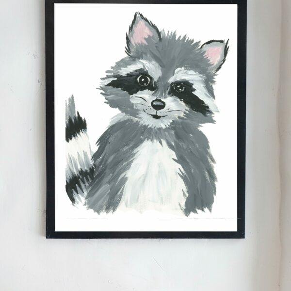 raccoon nursery art print framed on wall